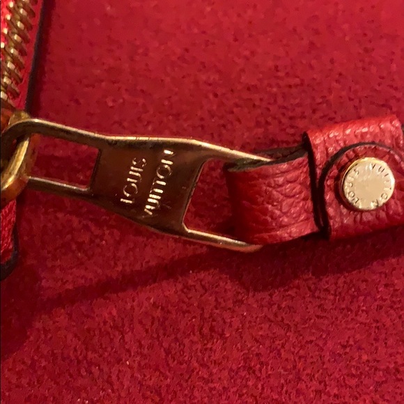LV red leather Empreinte zippy wallet
